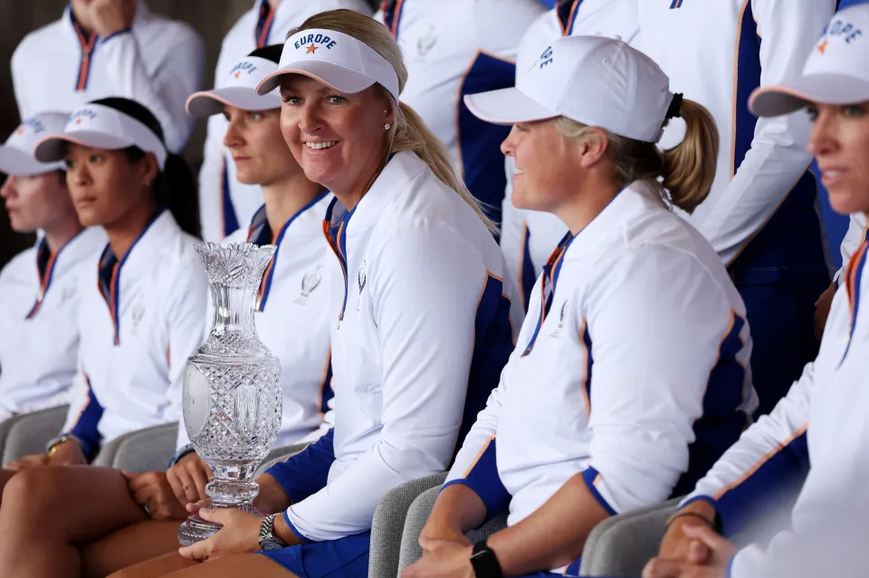 Team Europe pose with the Solheim Cup trophy