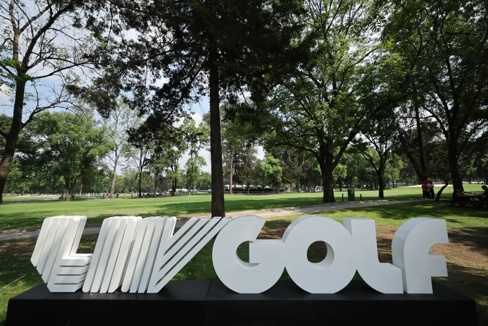 LIV Golf signage in front of trees at the LIV Golf Mexico City event at Club de Golf Chapultepec