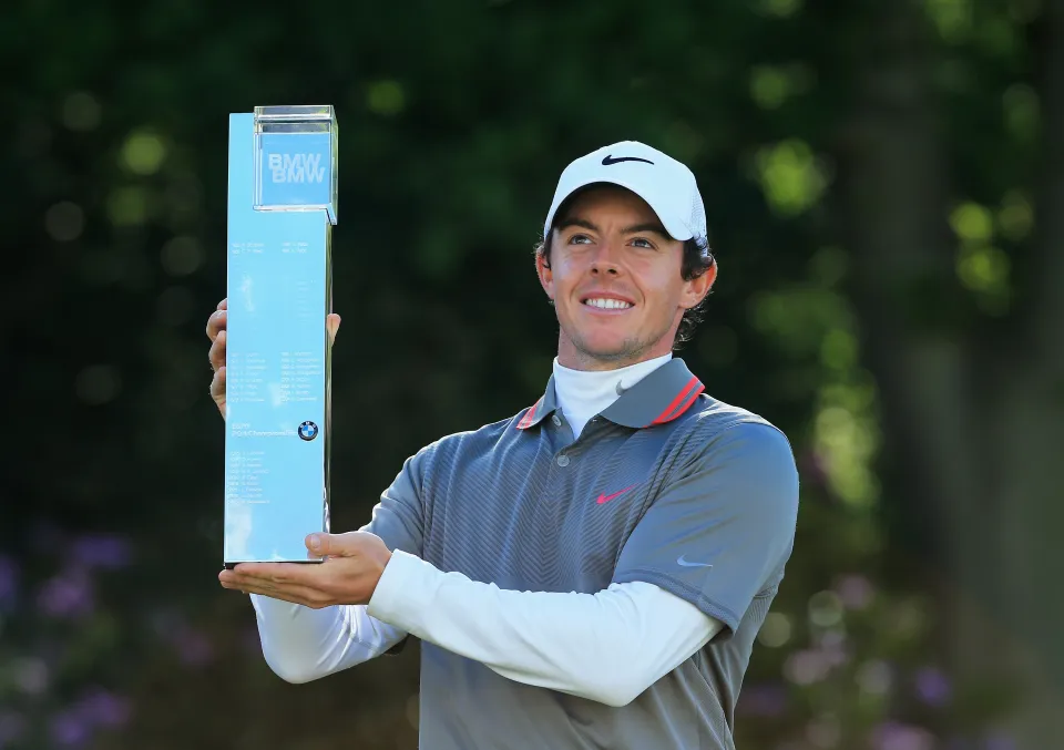 Rory McIlroy celebrates with the trophy after winning the 2014 BMW PGA Championship at Wentworth.