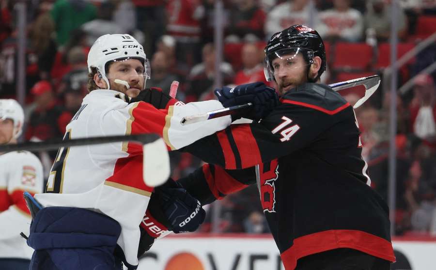 Panthers' Matthew Tkachuk (left) and Hurricanes' Jaccob Slavin (right)