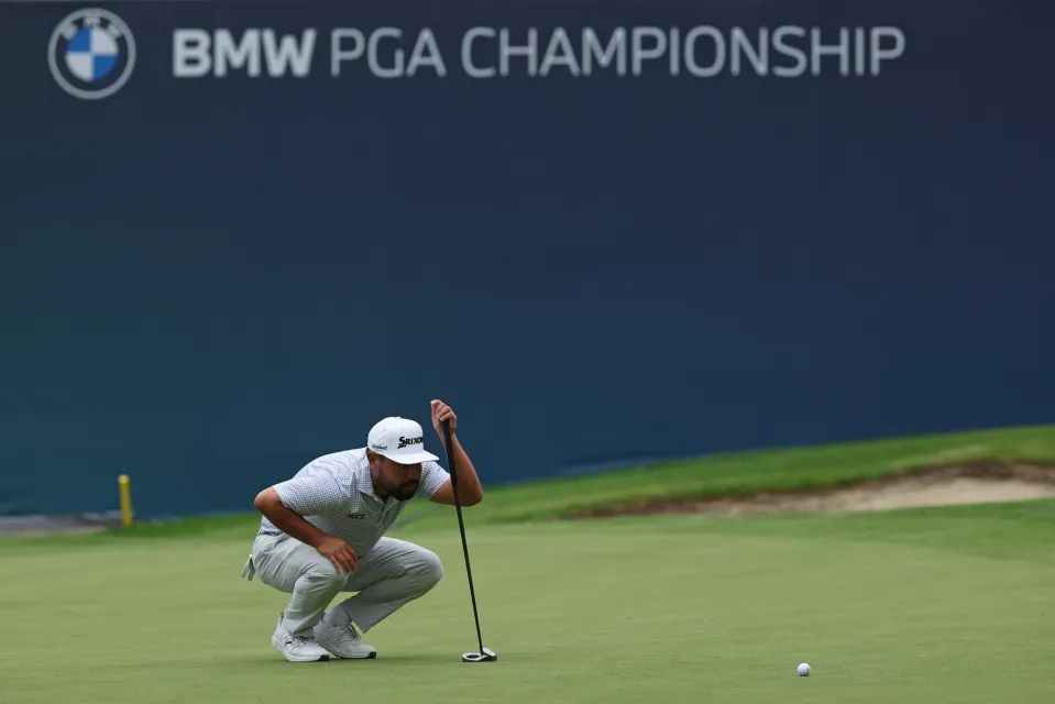 US golfer JJ Spaun lines up a putt on the 18th green on day three of the BMW PGA Championship at Wentworth Golf Club in the town of Virginia Water in Surrey, southwest of London, on September 19, 2026.
