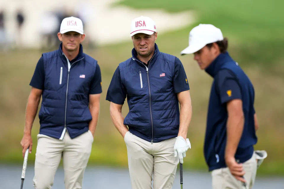 Koivun (r) has been enjoying his first Presidents Cup experience alongside Jacob Bridgeman (l) and Justin Thomas (c)
