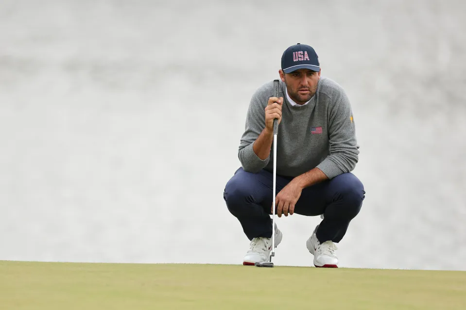 Scottie Scheffler of the U.S. Team lines up a putt on the 16th green during Friday's Foursomes on day two of the Presidents Cup 2026 at Medinah Country Club on September 25, 2026 in Medinah, Illinois. 