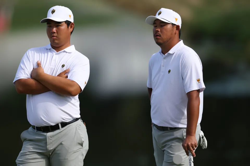 Tom Kim of South Korea and the International Team and Si Woo Kim of South Korea and the International Team react on the eighth green during Saturday's Foursome matches on day three of the Presidents Cup 2026 at Medinah Country Club on September 26, 2026 in Medinah, Illinois.