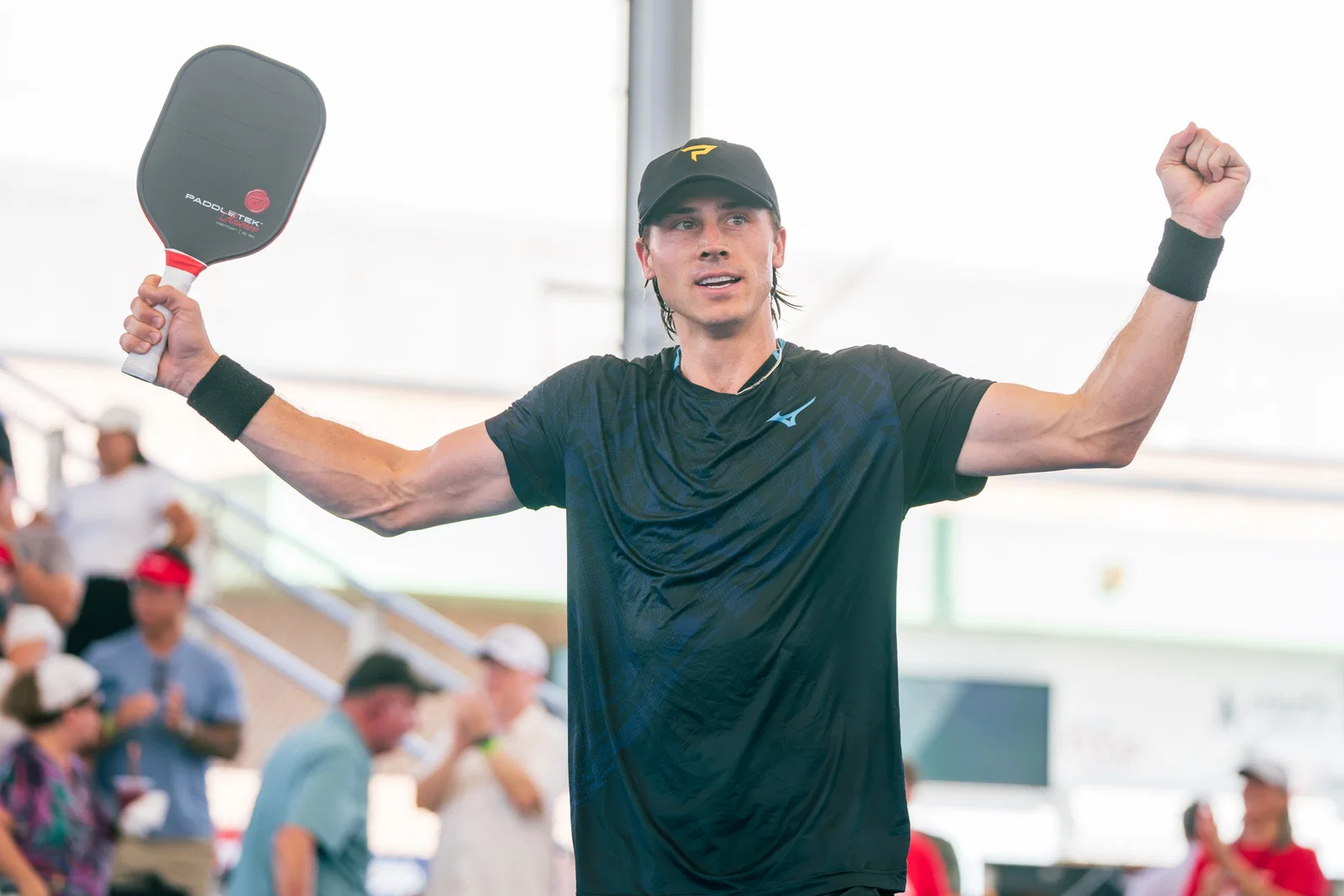 Christian Alshon celebrating winning the men's doubles title at the Veolia Arizona Open in Mesa, AZ.